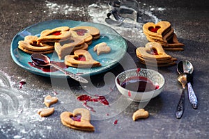 Czech traditional christmas sweets Linzer cookies with homemade red currant jam