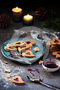 Czech traditional christmas sweets Linzer cookies with homemade red currant jam