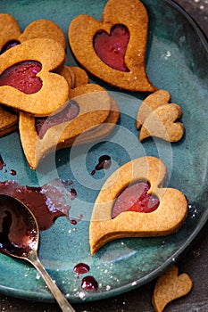 Czech traditional christmas sweets Linzer cookies with homemade red currant jam