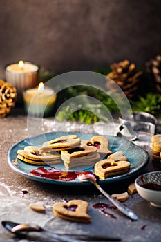 Czech traditional christmas sweets Linzer cookies with homemade red currant jam