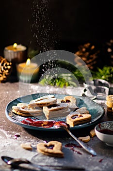 Czech traditional christmas sweets Linzer cookies with homemade red currant jam