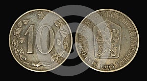 Czechoslovak koruna coin isolated on a black background.