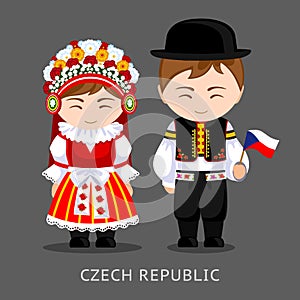 Czechs in national dress with a flag. photo