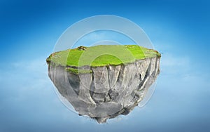 3D fantasy floating island with green grass land on blue sky