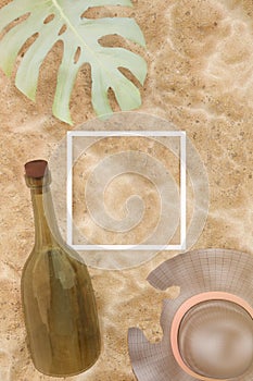 33d illustration. Beach Sand background . Straw hat , Tropical leaf and message in bottle on sandy background, top view . White