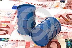 3d illustration: Blue barrels of oil lie on the background of banknote ten Euro, European Union. Money. Petroleum business