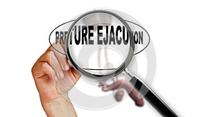 Close up of magnifying glass.Concept of premature ejaculation photo