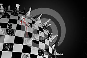 3D illustration of a globe in the form of a chessboard and a figure of a king with blood drips