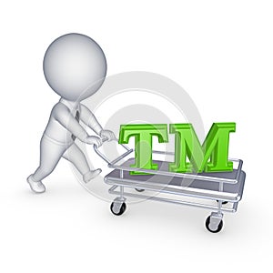 3d person with pushcart and TM symbol. photo