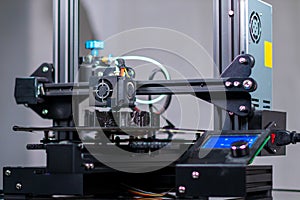 Three dimensional plastic printer during work