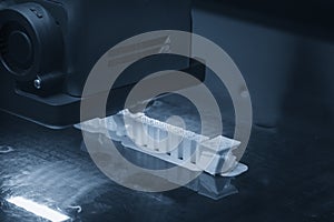 The 3D printer machine  print out the sample model prototype.