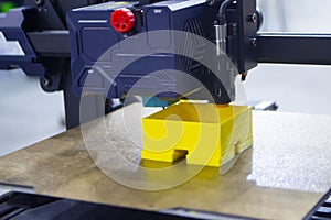 3D printer printing object close-up. Process creating three-dimensional model