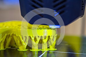 3D printer printing object close-up. Process creating three-dimensional model