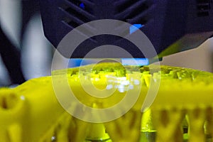 3D printer printing object close-up. Process creating three-dimensional model