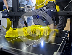 3D printer printing object close-up. Process creating three-dimensional model