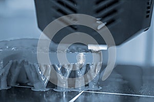 3D printer printing object close-up. Process creating three-dimensional model