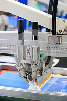 3D printer printing plastic in a printing press. 3D printing technology