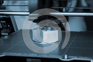 3D printer prints object Process of printing model on 3D printer. Model printed