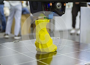 3D printer prints object Process of printing model on 3D printer. Model printed