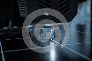 3D printer prints object Process of printing model on 3D printer Model printed