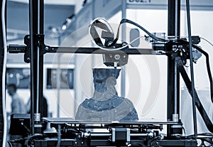 3D printer prints object Process of printing model on 3D printer Model printed