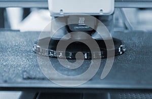 3D printer Working 3D printer process printing object molten black plastic