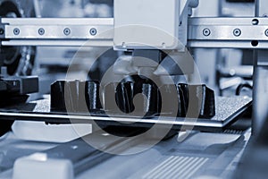 3D printer Working 3D printer process printing object molten black plastic