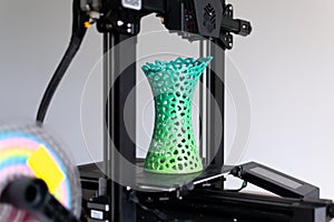 3d printing of a vase with multicolored pla filament photo