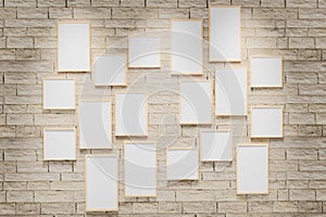 3D render illustration of multi size blank photo frames on the sand block bright wall. Empty picture frame mockup