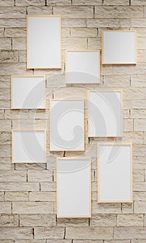 3D render illustration of multi size blank photo frames on the sand block bright wall. Empty picture frame mockup