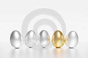 3d render of silver and gold easter eggs on a white background