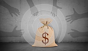 3d rendering of a brown money bag with a dollar sign stands on concrete background with many shadow hands grabbing and