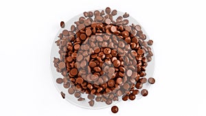 3d rendering of chocolate chips pile from a top on a white background