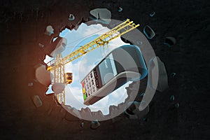 3d rendering of hoisting crane carrying point-of-sale terminal and breaking hole in wall with blue sky seen through. photo
