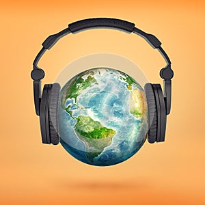 3d rendering of large black headphones placed on an Earth globe pretending it`s a head.