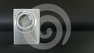 Modern white washing machine on a black