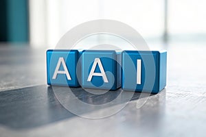 3D AI letters formed with small blue boxes photo