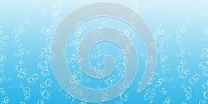 3D rendering of soap bubbles isolated on a light blue background