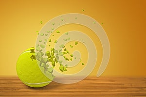 3d rendering of a tennis ball lying on wooden surface and starting to disintegrate on yellow background with much copy