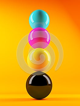 3d Stack of CMYK coloured spheres photo