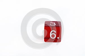 D6 transparent red dice for rpg, dnd, tabletop or board games on white background. Number 6