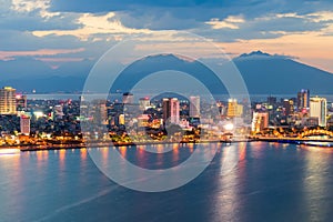 Da Nang city skyline cityscape at Han river at twilight in Da Nang, central Vietnam