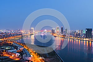 Da Nang city skyline cityscape at Han river at twilight in Da Nang, central Vietnam