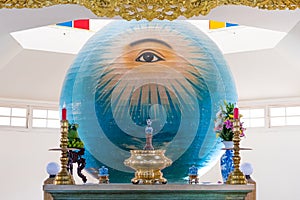 Da Nang, Vietnam: a sphere with Left Eye of God and the altar in Trung Hung Buu Toa, a Caodaist temple