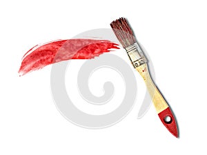 Dab of red paint and a brush on a white background