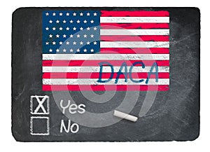 DACA Yes concept using chalk on slate blackboard