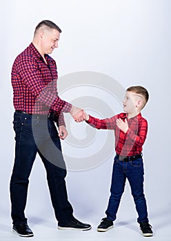 Dad and adorable child. Parenthood concept. Fathers day. Father example of noble human. Cool guys. Father little son red