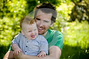 Dad and baby boy outdoors