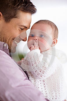 Dad, baby and home with love, support and bonding together with newborn and smile. Happy, family and father with young