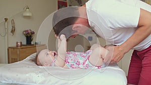 Dad with a baby. Stimulation hormon oxytocin in father, infant during play.